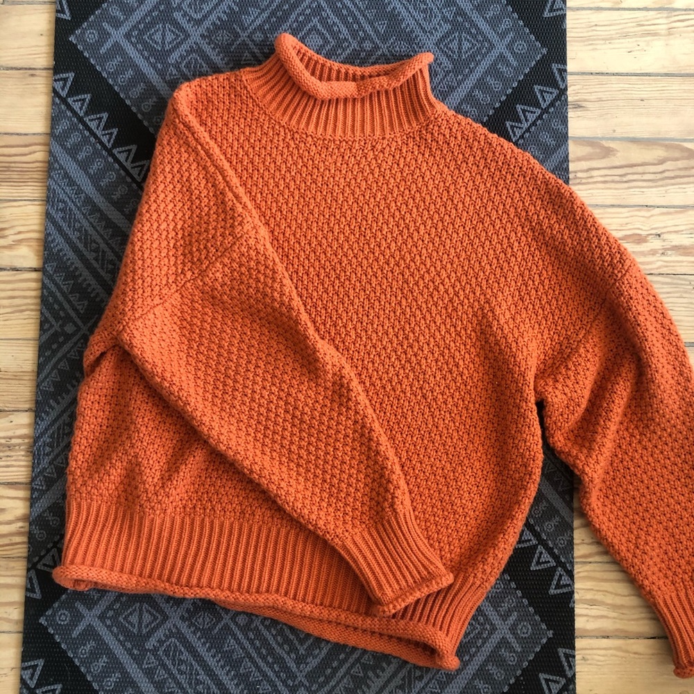 Orange knit turtleneck